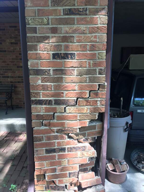 Brick wall prior to rebuilding